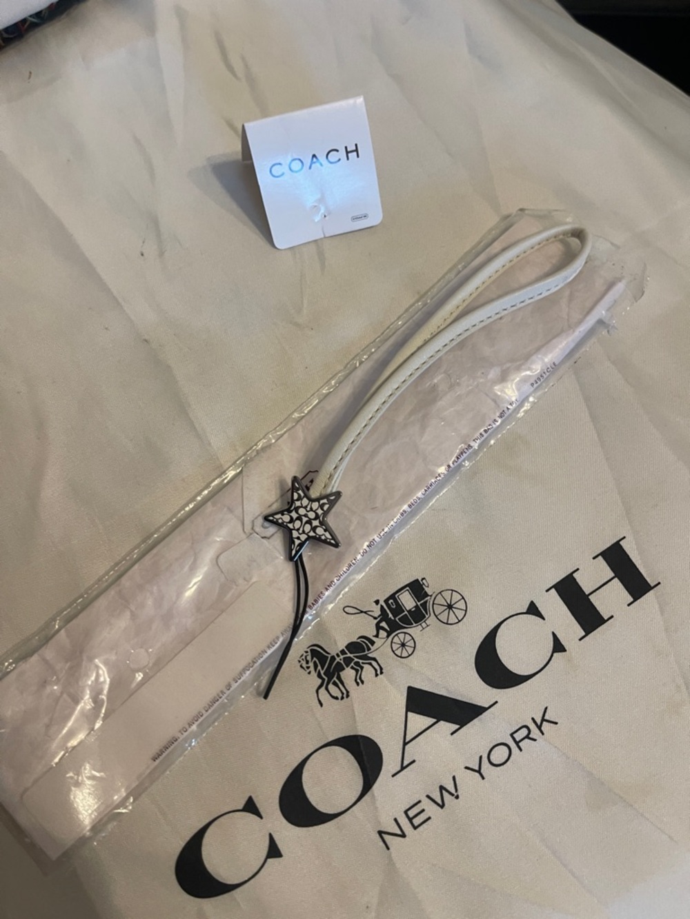 Coach White Leather Laynard Strap with Star Charm